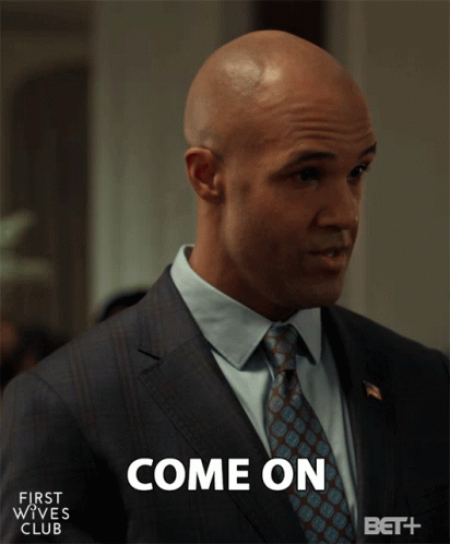 Man In Suit And Tie Saying Come On GIF
