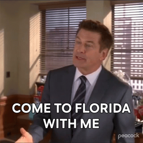 Man in Suit and Tie Saying Come to Florida With Me