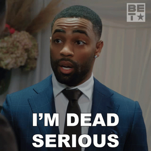 Man in Suit and Tie Saying Dead Serious