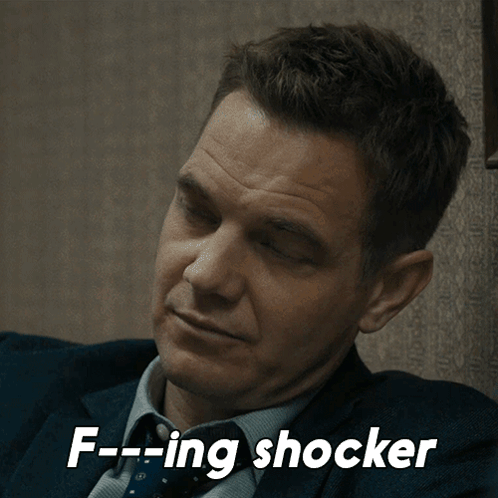 Man in Suit and Tie Saying F-ing Shocker