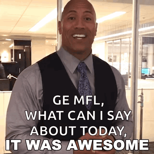 Man in Suit and Tie Saying Ge Mfl