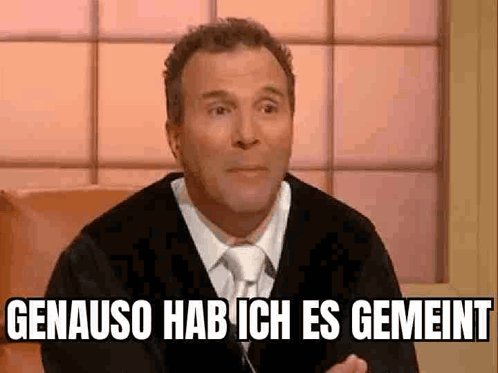 Man in Suit and Tie Saying Genauso Hab Ich Es Gemeint