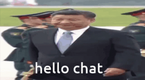 Man in Suit and Tie Saying Hello Chat