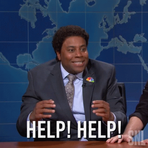 Man in Suit and Tie Saying Help