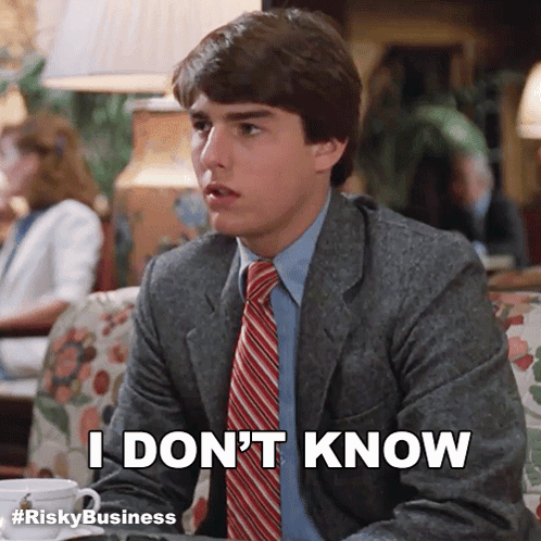 Man in Suit and Tie Saying I Don't Know