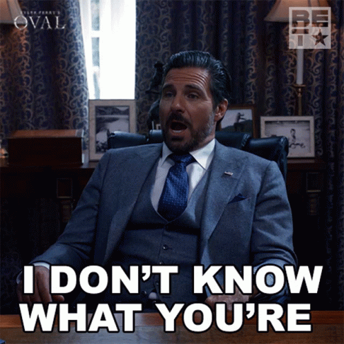 Man in Suit and Tie Saying I Don't Know