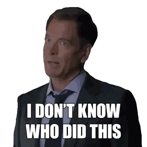 Man in Suit and Tie Saying I Don't Know Who Did This