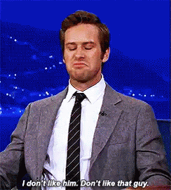 Man in Suit and Tie Saying I Don't Like Him