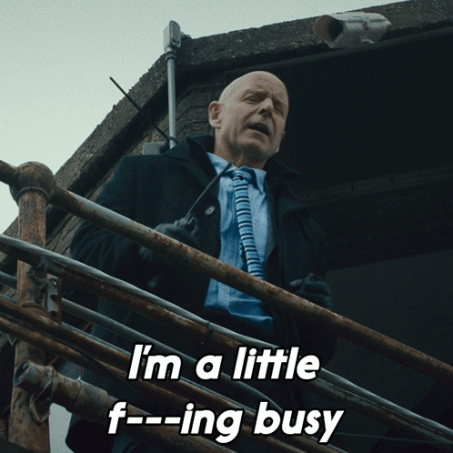 Man in Suit and Tie Saying I'm a Little F Ing Busy