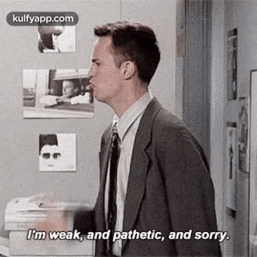 Man In Suit And Tie Saying I'm Weak And Pathetic And Sorry GIF
