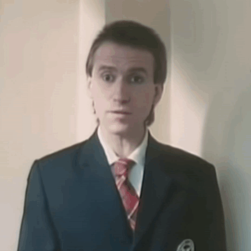Man in Suit and Tie Saying I Was Up Here