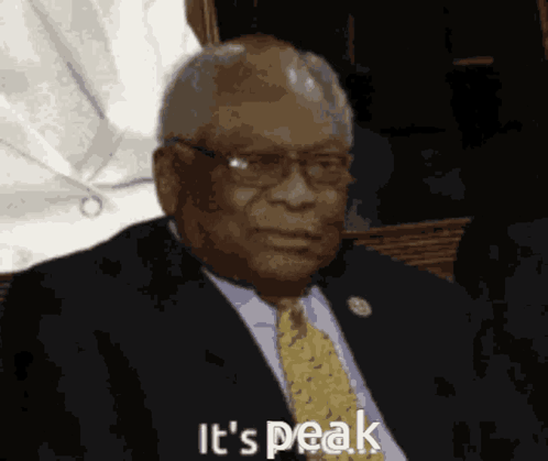Man In Suit And Tie Saying It's Peak GIF