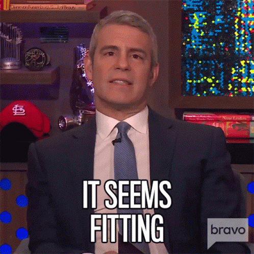 Man in Suit and Tie Saying It Seems Fitting on Bravo