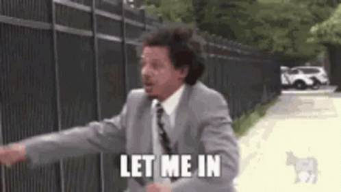 Man in Suit and Tie Saying Let Me In