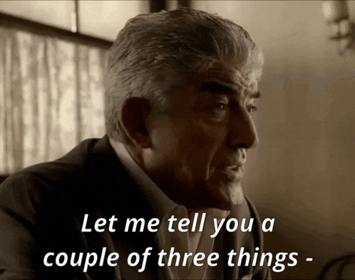 Man in Suit and Tie Saying Let Me Tell You