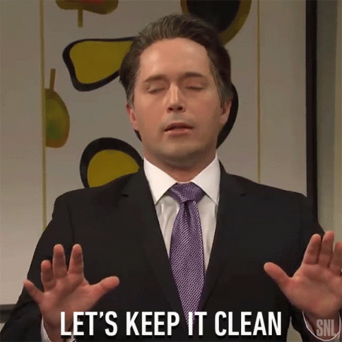 Man in Suit and Tie Saying Let's Keep It Clean