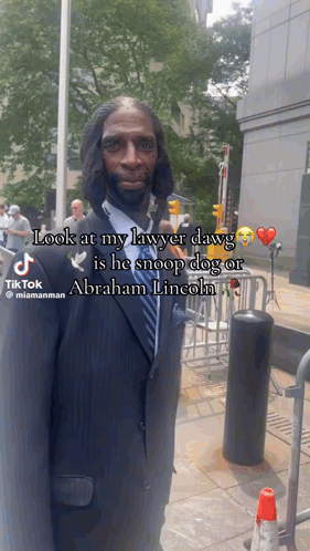 Man In Suit And Tie Saying Look At My Lawyer Dawg He Snoop Dog Or Abraham Lincoln GIF