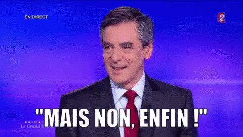 Man In Suit And Tie Saying Mais Non Enfin GIF