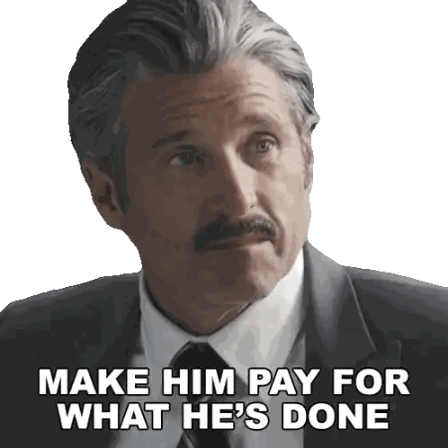 Man in Suit and Tie Saying Make Him Pay