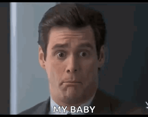 Man in Suit and Tie Saying My Baby