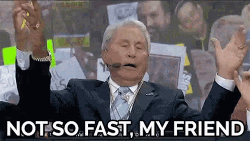 Man in Suit and Tie Saying Not So Fast