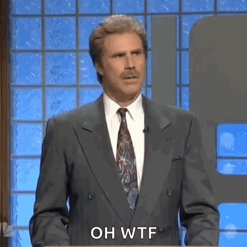 Man in Suit and Tie Saying Oh WTF