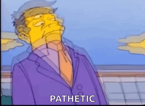 Man in Suit and Tie Saying Pathetic