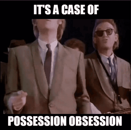 Man in Suit and Tie Saying Possession Obsession