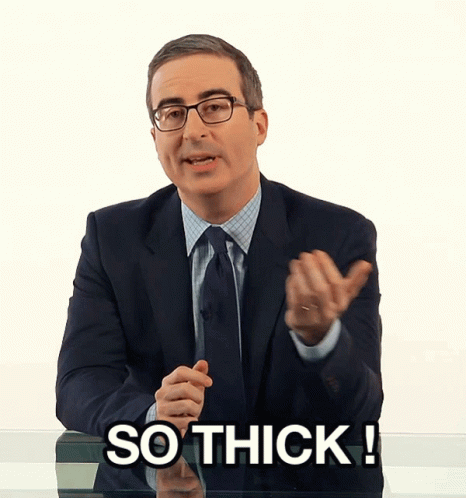 Man in Suit and Tie Saying So Thick