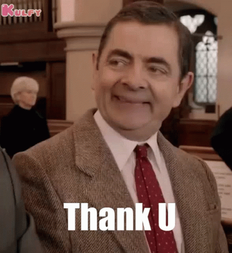 Man in Suit and Tie Saying Thank You