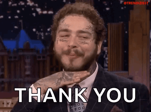 Man in Suit and Tie Saying Thank You Hand on Face