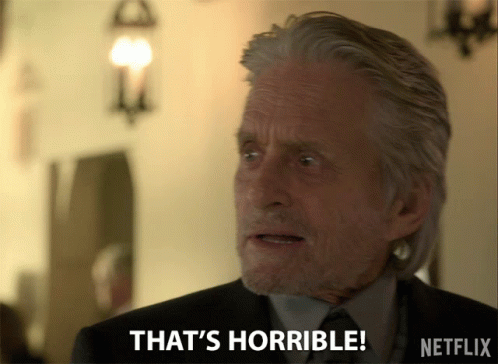 Man In Suit And Tie Saying That's Horrible On Netflix GIF