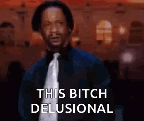 Man in Suit and Tie Saying This Bitch Delusional