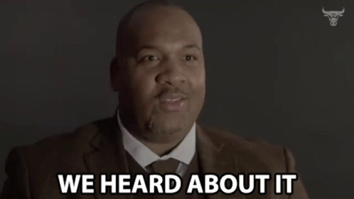 Man In Suit And Tie Saying We Heard About It GIF