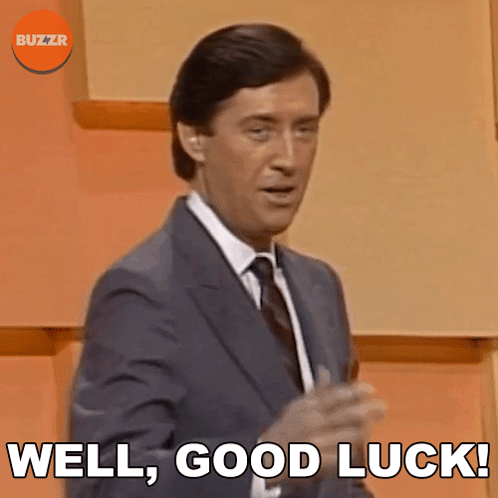 Man In Suit And Tie Saying Well Good Luck GIF