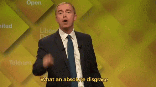 Man in Suit and Tie Saying What