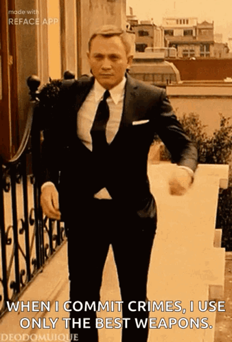 Man in Suit and Tie Saying When I Commit Crimes I Use Only the Best Weapons