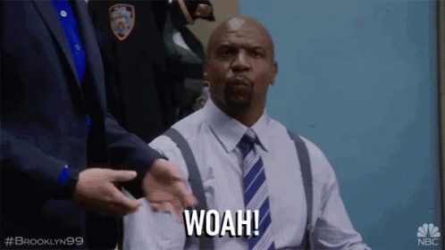 Man in Suit and Tie Saying Woah