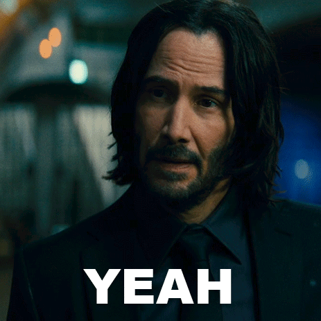 Man in Suit and Tie Saying Yeah