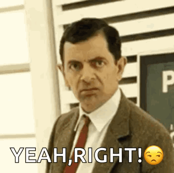 Man in Suit and Tie Saying Yeah Right