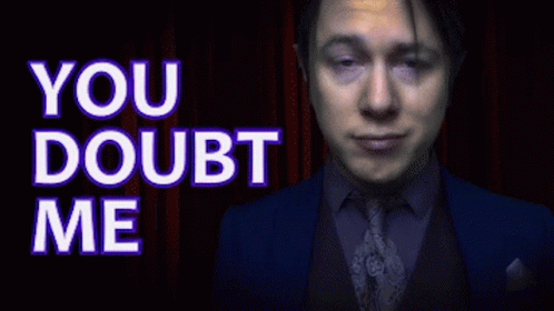 Man in Suit and Tie Saying You Doubt Me