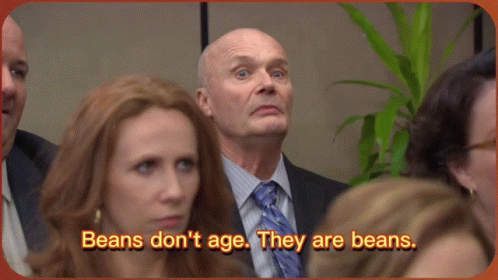 Man in Suit and Tie Says Beans Don't Age They Are Beans