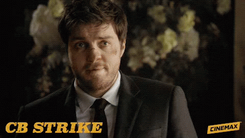 Man in Suit and Tie Says CB Strike