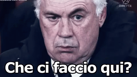 Man in Suit and Tie Says che ci faccio qui