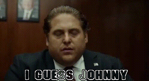 Man in Suit and Tie Says I Guess Johnny
