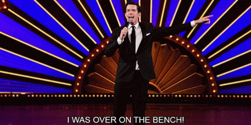 Man in Suit and Tie Says I Was Over on Bench