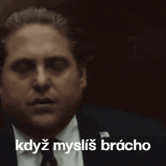 Man in Suit and Tie Says když myslíš bracho