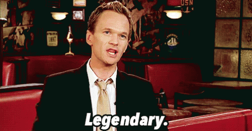 Man in Suit and Tie Says Legendary