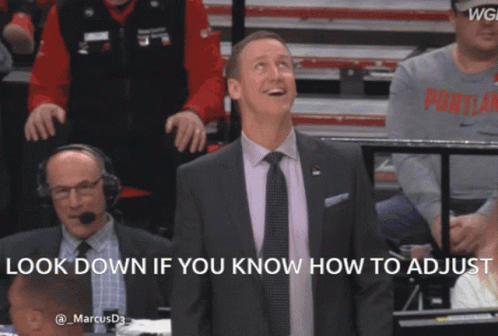 Man in Suit and Tie Says Look Down If You Know How to Adjust