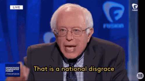 Man in Suit and Tie Says National Disgrace